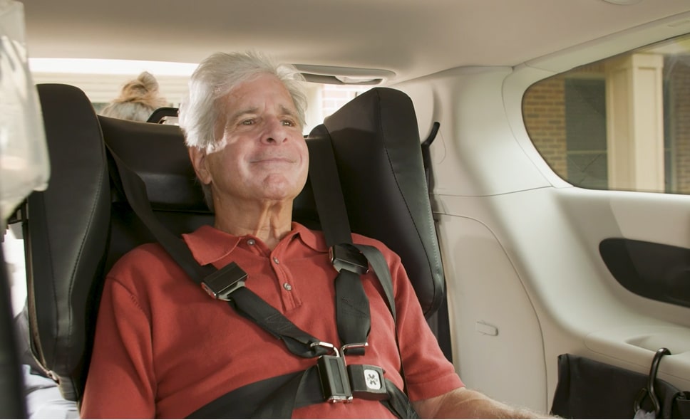 Main sitting in Traversa inside a van